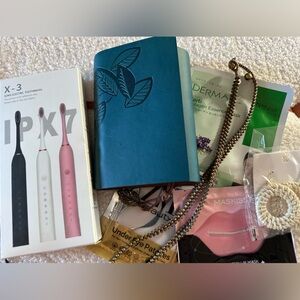 Teal Leaf-Embossed Journal with jewelry and self-care items